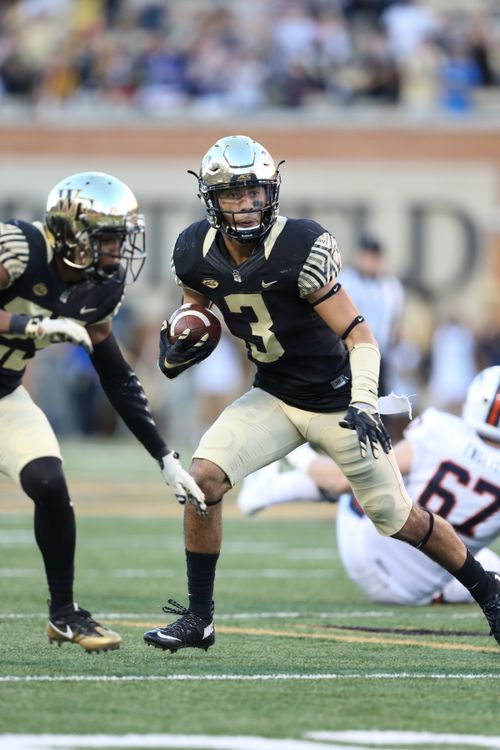 Wake Forest Defensive back Jessie Bates III advances the ball after an interception. (Photo credit: Wake Forest University) Wake Forest and Temple Square Off in the Military Bowl presented by Northrop Grumman