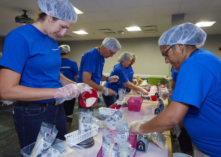 Employees at Northrop Grumman’s Rolling Meadows facility, in Illinois, packaged meals for Stop Hunger Now. Northrop Grumman Sends Hunger Packing During Hunger Action Month