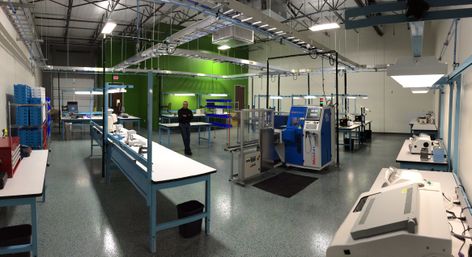 Employee Chris Graves stands in new Houston facility Employee Chris Graves stands in new Houston facility